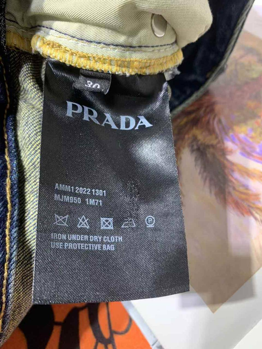 Джинсы Prada