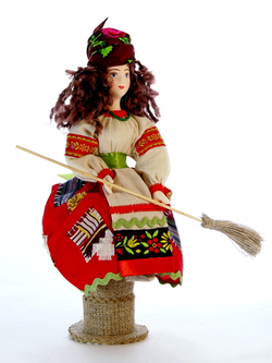 Кукла коллекционная молодая Баба Яга на ступе с помелом.