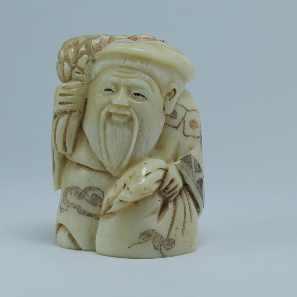 Нэцкэ Фукурокудзю с колосьями и мешком риса