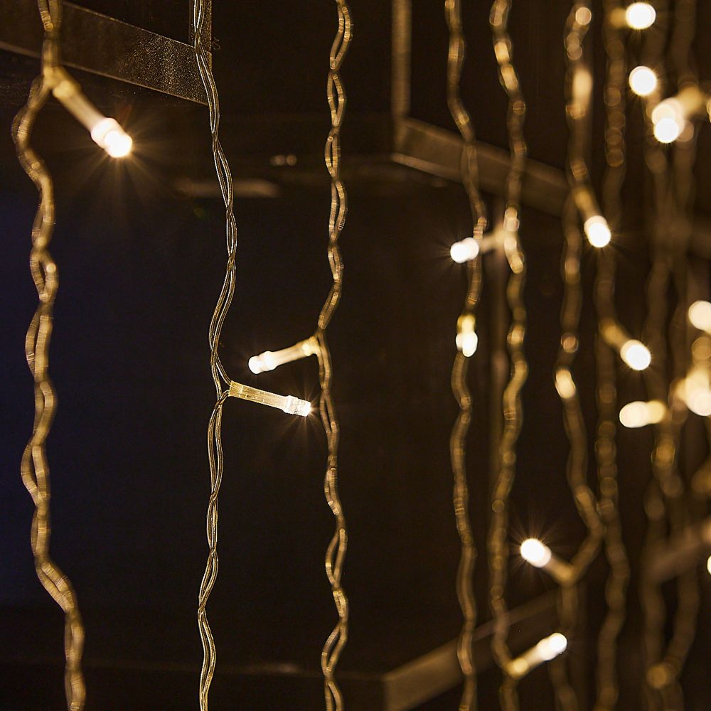 ULD-C3020-160-DTA WARM WHITE IP20 Занавес светодиодный. 3х2м. 160 светодиодов. Теплый белый свет. Провод прозрачный. TM Uniel