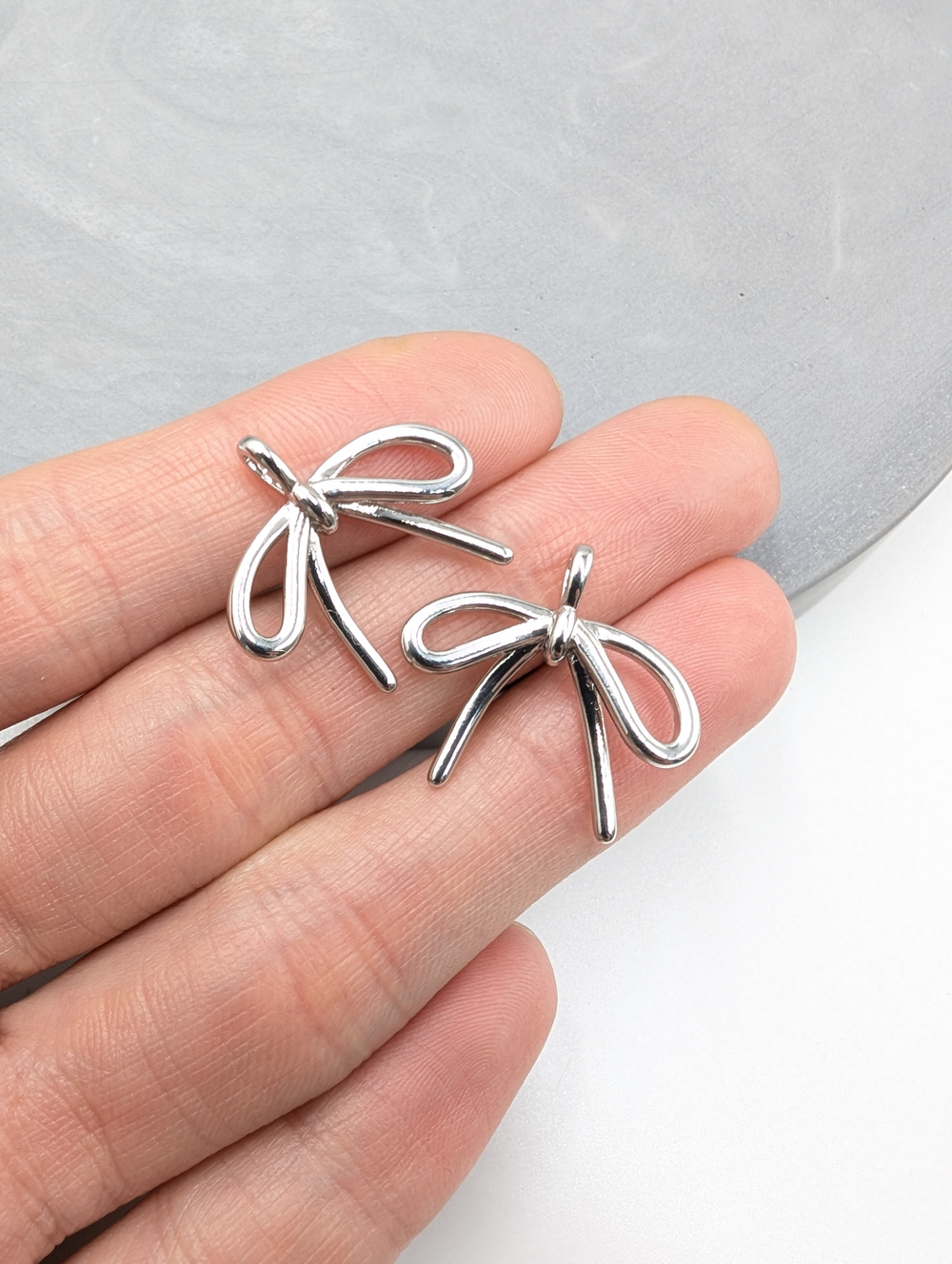 Подвеска бант 22*14мм