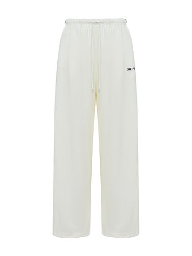 Широкие спортивные брюки молочного цвета