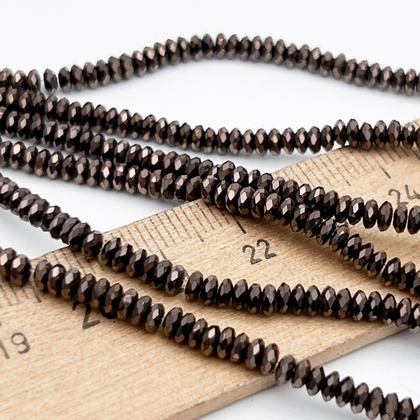 Гематит Рондель с огранкой бусины (имитация), цвет коричневый, размер около 1,5*3,5 мм, цена за отрезок 19 см (1/2 нити)