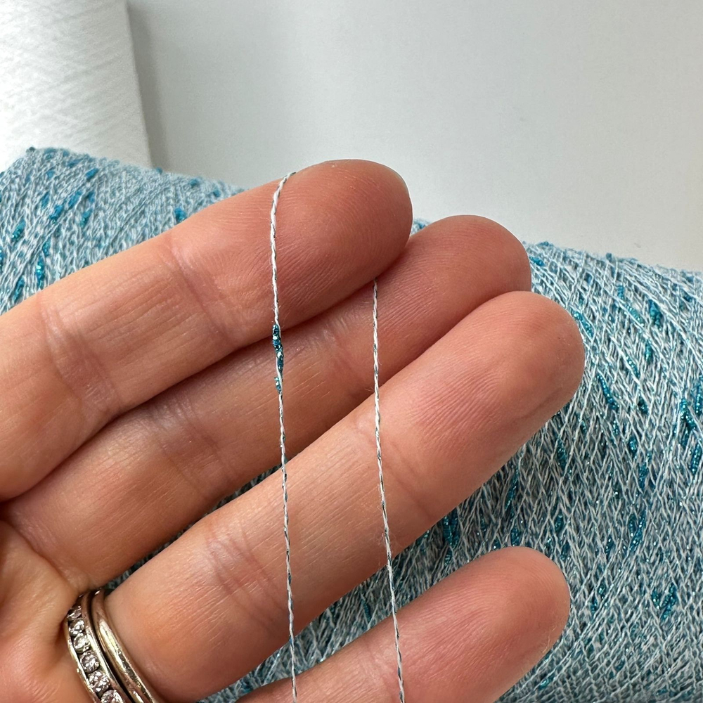 NODINO LUREX X IRON - Fashion Mill; 73% вискоза, 27% люрекс фактурный; 1300м/100гр; цвет: голубой люрекс на белой нити; S505 Есть бобинка: 200 гр