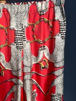 Шелковые брюки Gucci, 152