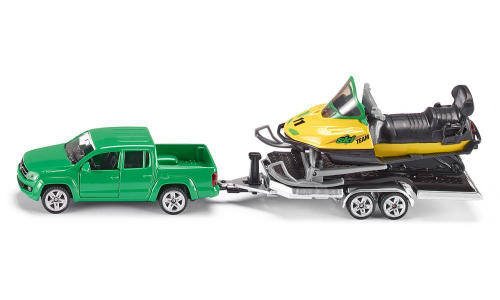 Машина с прицепом и снегоходом