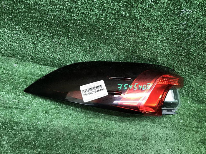 Фонарь левый внешний Toyota Corolla Е210 (18-нв)