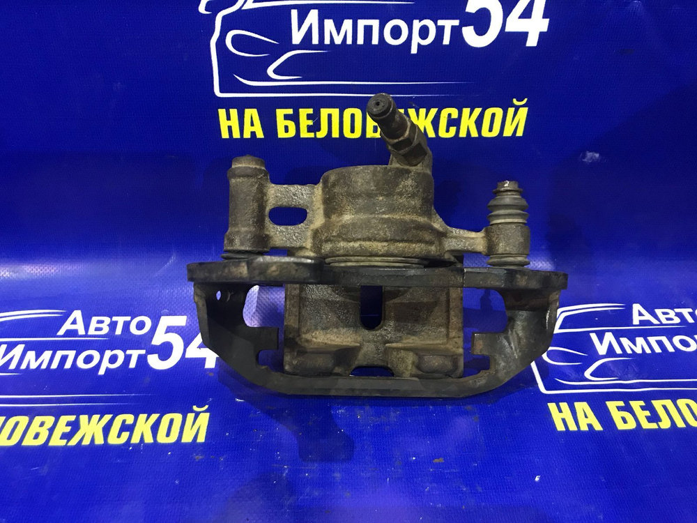 Суппорт тормозной передний правый TOYOTA LITEACE 1988
