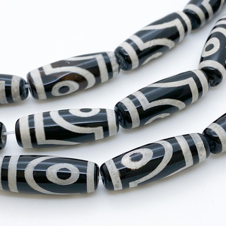 "Дзи" 2 Глаза, размер около 30*10 мм, цена за 1 шт