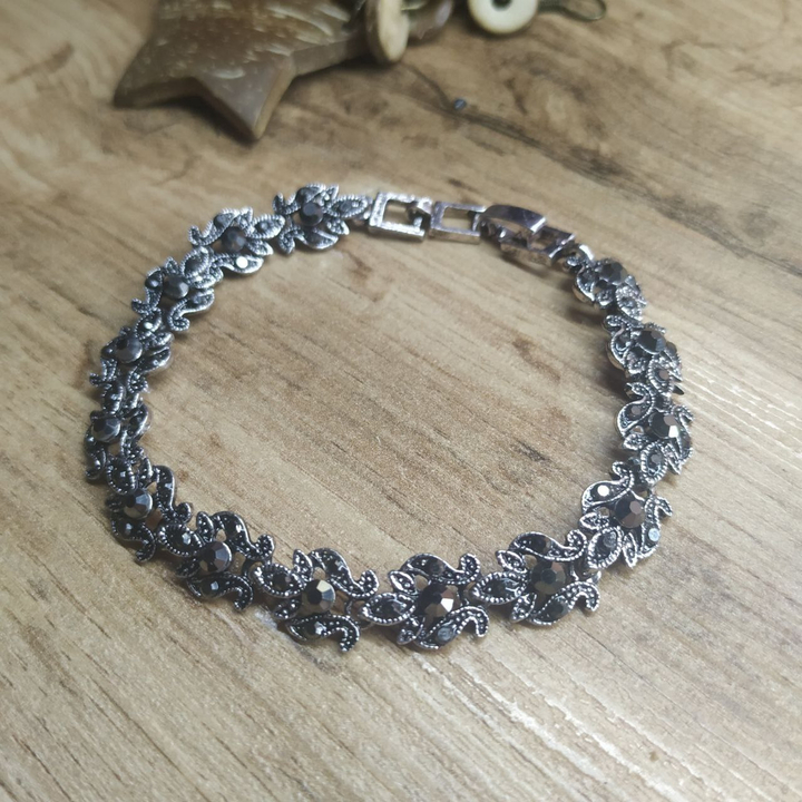 Браслет Vogue 2 Королевская лилия малая стразы графитовые металл серебристый