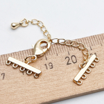 Замок-карабин с разделителями на 5 нитей, цвет золото, размер карабина 12 мм, размер разделителя 15*5 мм, цена за 1 шт