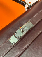 Женская сумка Hermes Kelly коричневого цвета