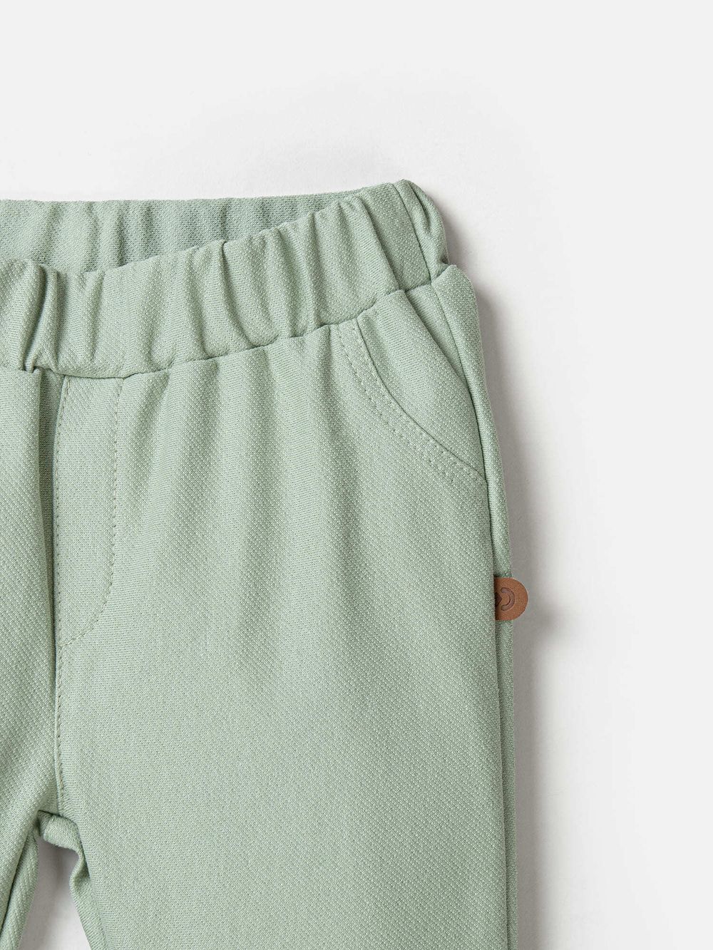 Брюки из джинскота "Шалфей" с отворотами 0+