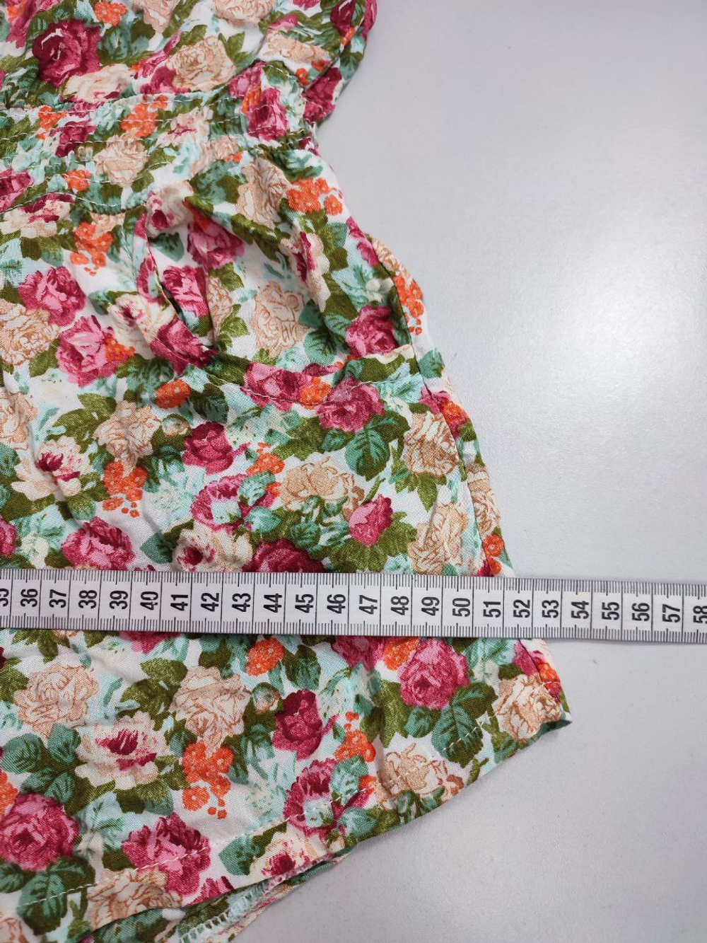 Комбинезон с цветочным принтом 42-44 размер