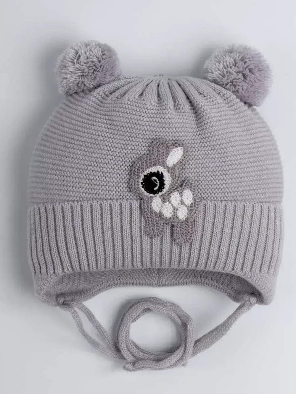 Шапка зимняя детская вязаная на завязках