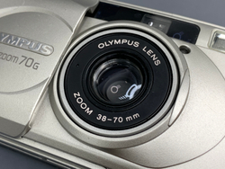 Olympus SuperZoom 70G с царапиной на линзе