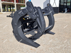 Захват лесной на Экскаватор-погрузчик CAT