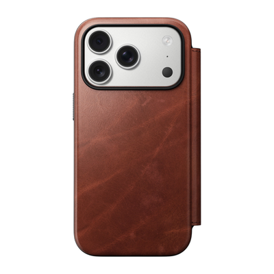 Кожаный чехол-книжка MagSafe Nomad Horween Modern Leather Folio Limited Edition для iPhone 17 Pro Гибридный укреплённый чехол из натуральной кожи Horween с сенсорной накладкой для Контроллера камеры. Есть отделение для купюр и встроенный картхолдер — вмещ