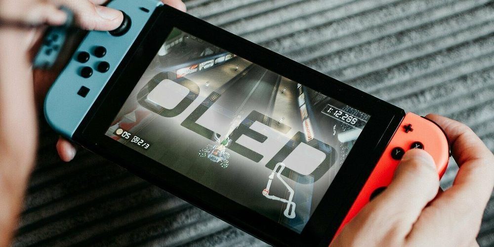 Игровая приставка Nintendo Switch OLED 64 ГБ, без игр, неоновый синий/неоновый красный