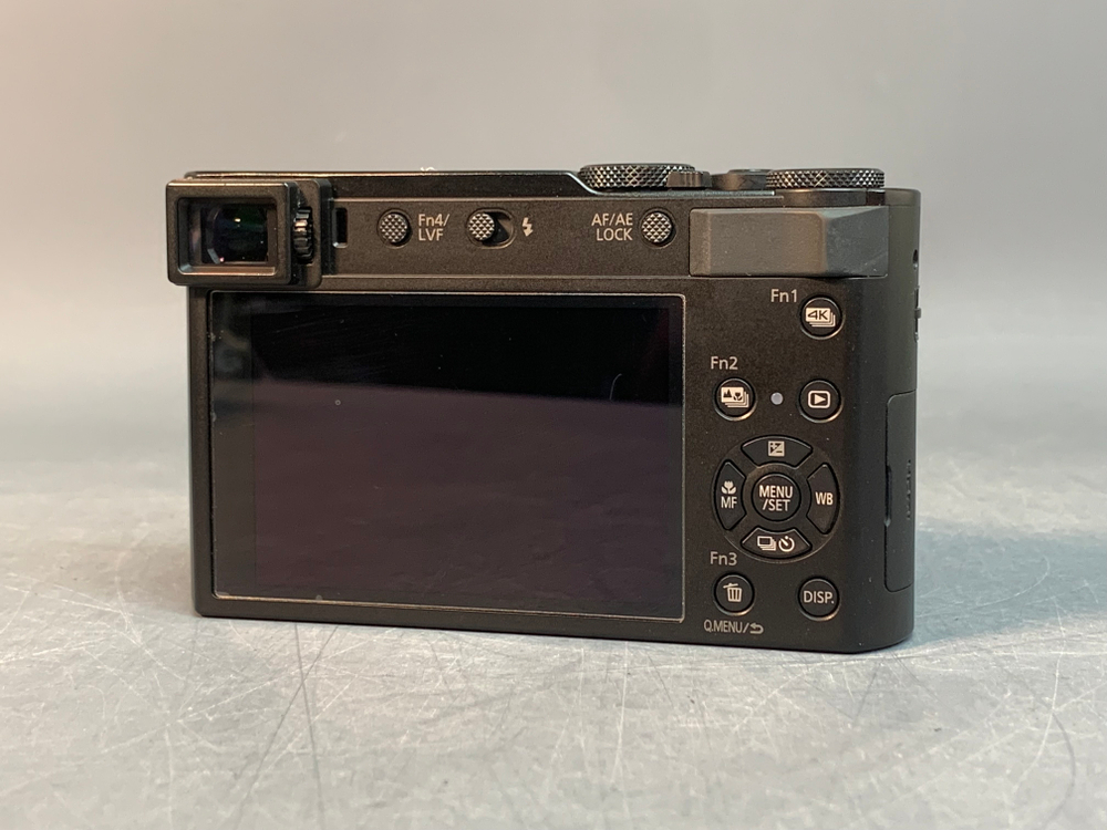 Panasonic Lumix DC-TZ202, налет на линзе