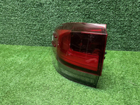 Фонарь левый внешний Toyota Land Cruiser 300 21-нв