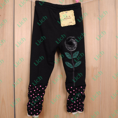 Брюки детские из контрастных тканей с аппликацией цветка