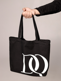 Shopper with "Stranger" logo