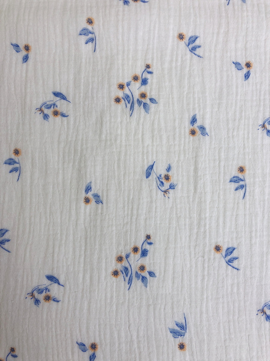 Муслин принт цветы голубые на молочном D91