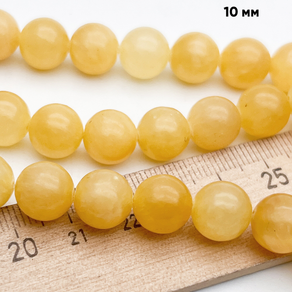 Кальцит желтый бусины, диаметр около 10,3-10,7 мм, цена за 18-19 шт (1/2 нити)