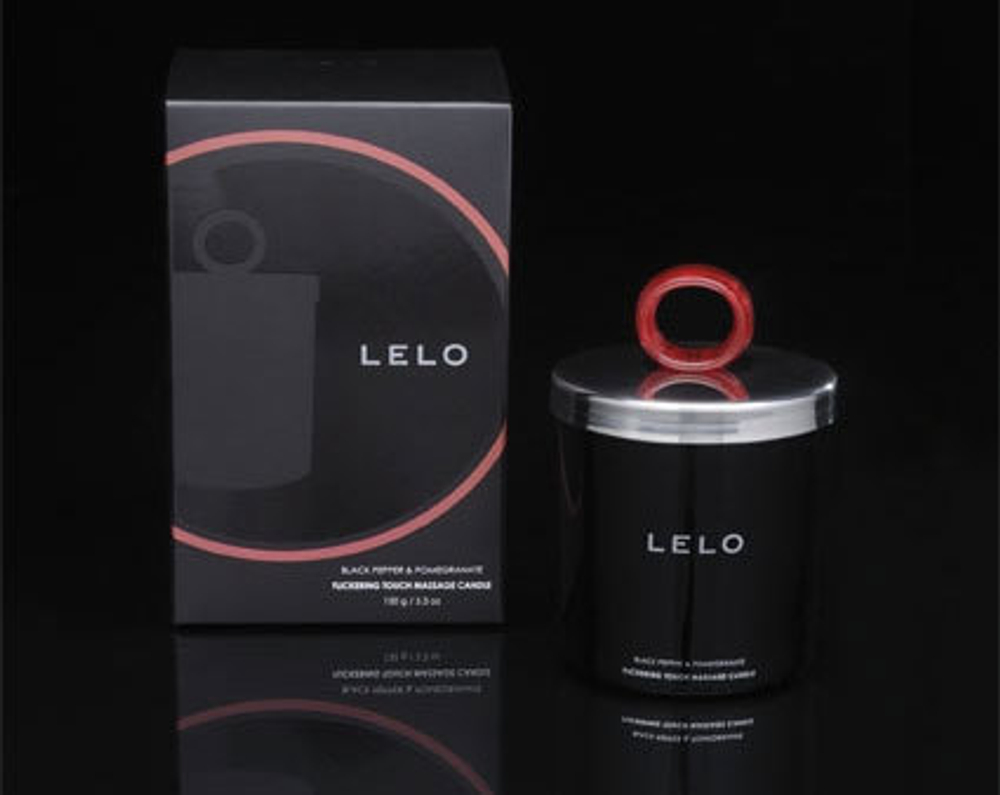 Массажная свеча  Мерцающее прикосновение  с ароматом снежной груши и кедрового дерева (LELO)