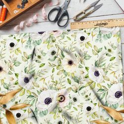 Ткань флис белые цветы на зеленом