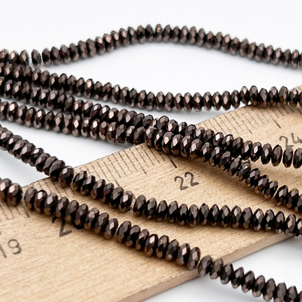 Гематит Рондель с огранкой бусины (имитация), цвет коричневый, размер около 1,5*3,5 мм, цена за отрезок 19 см (1/2 нити)