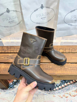 Коричневые кожаные ботинки Prada