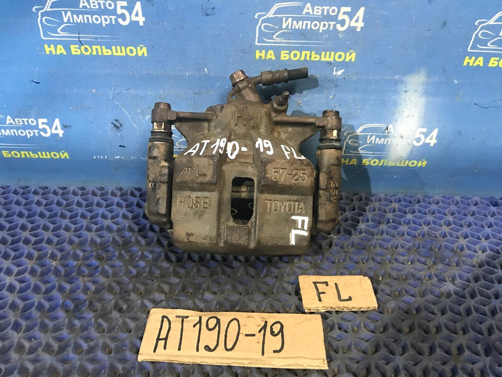 Суппорт тормозной передний левый TOYOTA CARINA E 1996