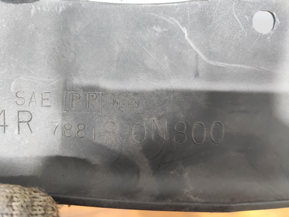 Брызговик задний правый накладка Almera (N15) 95-00  Оригинал 788180N800