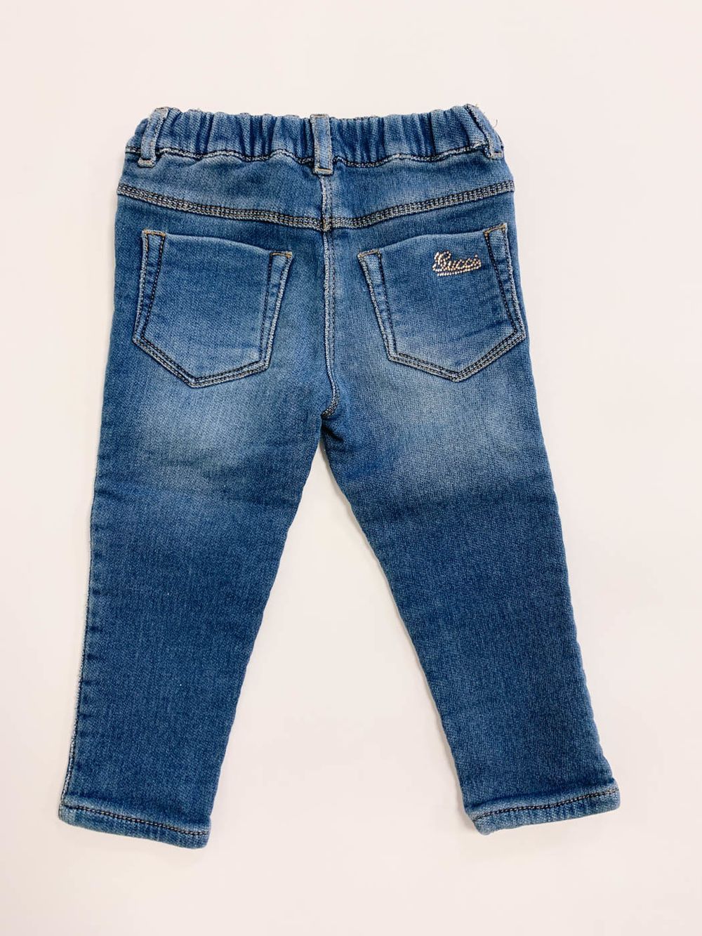 Джинсы Gucci, 86