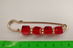 Булавка брошь "Красные камешки" для кардигана, пальто, платков, костюмов, шарфа, одежды .Цвет ярко красный.