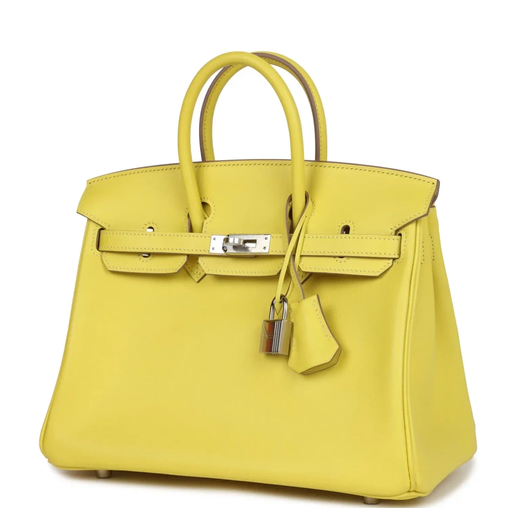 Сумка из кожи питона с аксессуарами Hermès
