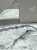 Солнечные очки Prada