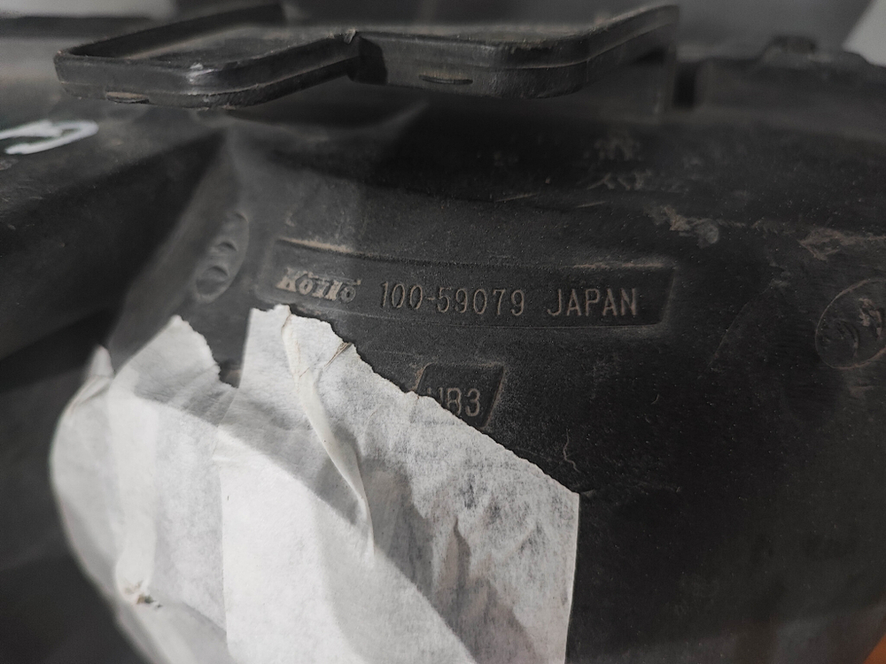 Фара левая ксенон Suzuki Grand Vitara 2 (JT) 05-15 Б/У Оригинал 3532065JB2