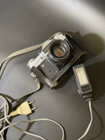 Фотоаппарат пленочный "Zenit-E" с объективом "Helios-44-2" и фотовспышкой "Электроника ФЭ-27", Оптико-механический завод "Зенит", СССР, 1965-1982 гг. в кофре