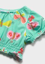 топ с юбкой и повязкой на голову