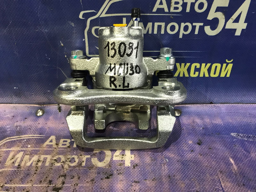 Суппорт тормозной задний левый TOYOTA HARRIER 2003-2012
