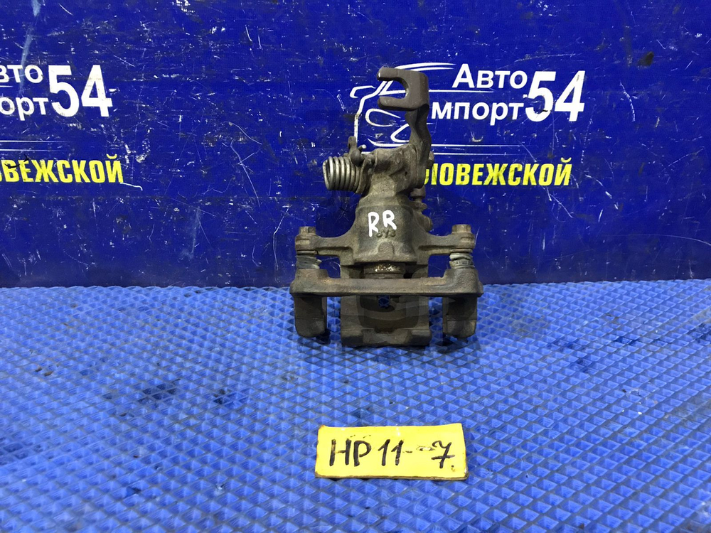 Суппорт тормозной задний правый NISSAN PRIMERA 1998