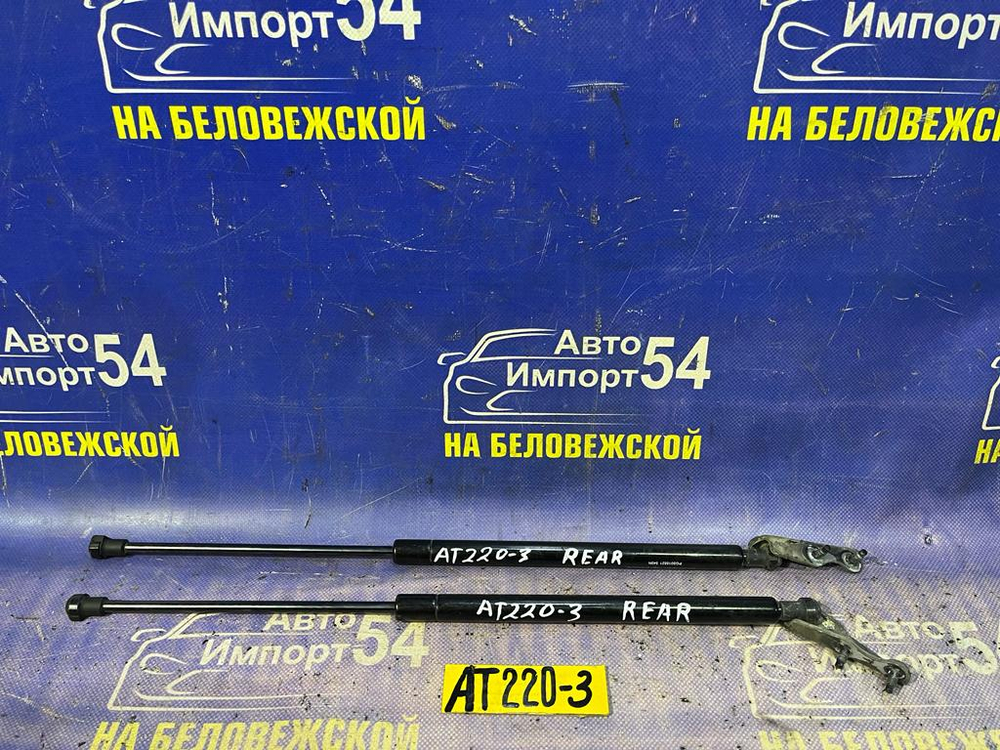 Амортизатор задней двери левый TOYOTA AVENSIS 1999