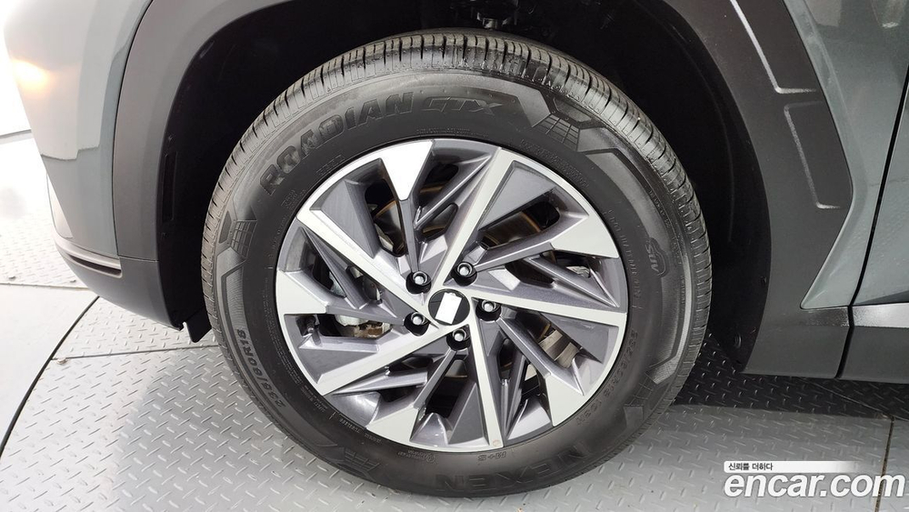 Hyundai Tucson (NX4) Бензин 1.6 Turbo 4WD (01.2023)