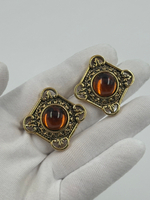 Серьги с коричневыми кабошонами Avon