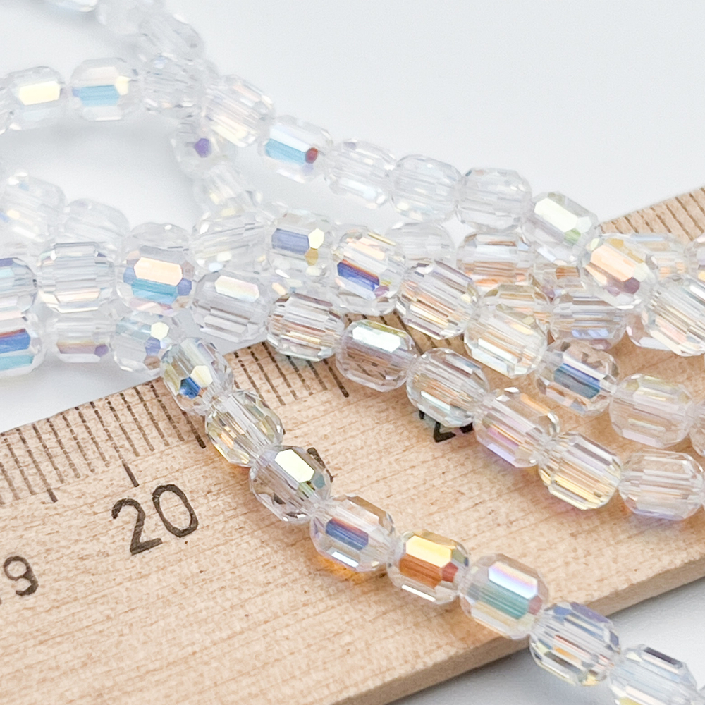 Бусина стекло, цвет прозрачный АВ, размер 4,8*4 мм, цена за отрезок 19 см (1/2 нити)