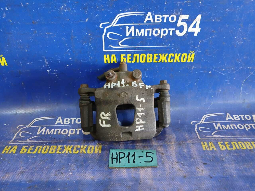 Суппорт тормозной передний правый NISSAN PRIMERA 1998