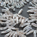 Жемчуг культивированный Бива, белый, со смещенным боковым отверстием 14-38мм